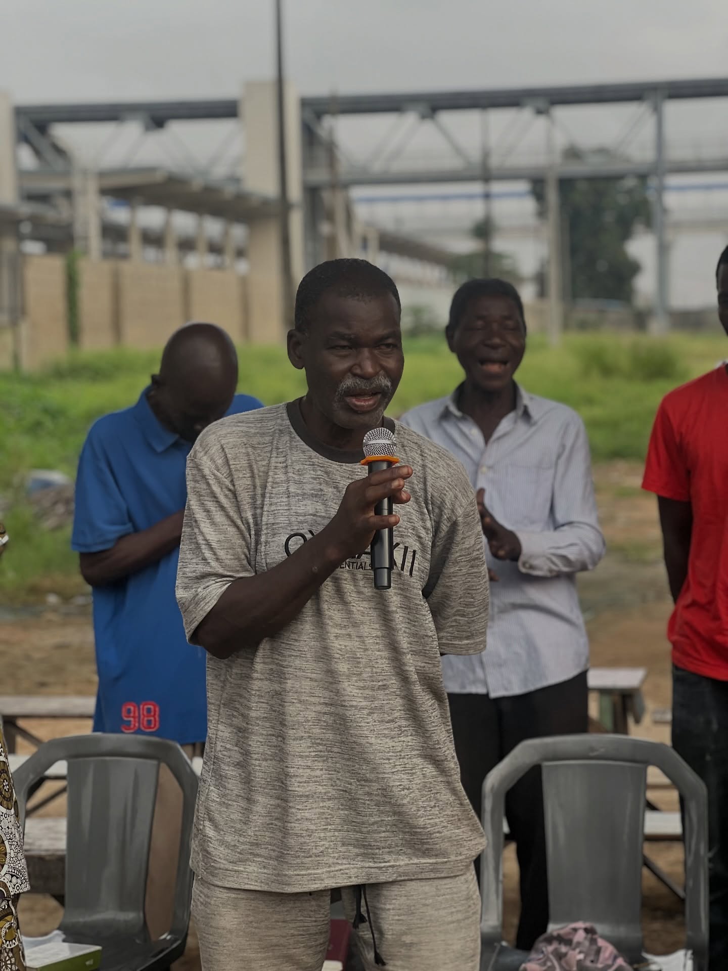 Crowd in outdoor prayer meeting
