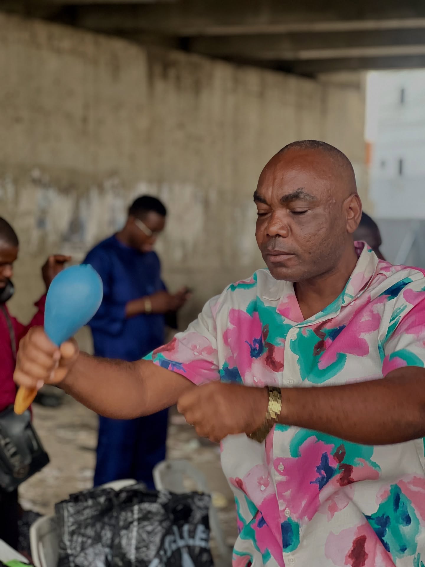 Worship leader with maracas